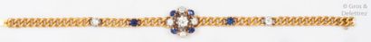 null Bracelet gourmette en or jaune et or gris à motif floral orné de diamants de...