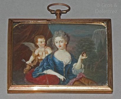 null Ecole française vers 1715-1720

Portrait d'une dame de qualité tenant un médaillon,...