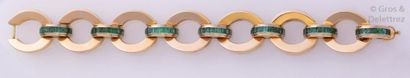 null Bracelet en or rose et platine à maillons ovales ajourés alternés de motifs...