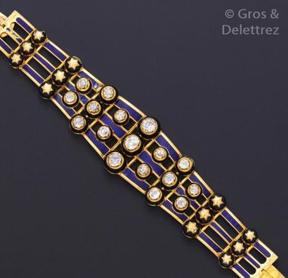 null Bracelet bandeau en or jaune articulé, ajouré et ciselé à décor d’ «?Étoiles?»,...