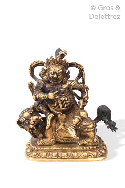 null Tibet, XIXe siècle

Statuette en bronze dorée, représentant un Jambala en armure...