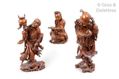 null Chine, vers 1930

Lot de trois bois sculpté représentant Zhoulao, Guanyin et...