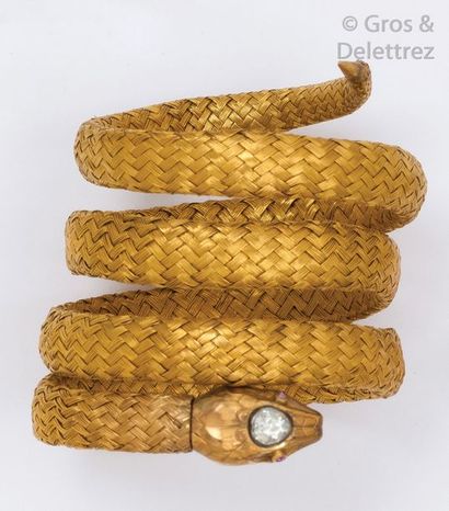 null Bracelet «Serpent» en or jaune tressé, la tête sertie d'un diamant taillé en...