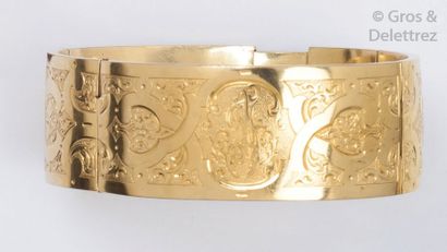 null Bracelet jonc ouvrant en or jaune à décor ciselé.
Époque Napoléon III.
P. 39g....
