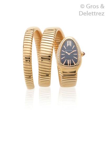 null BULGARI - «Serpenti» - ref. SPP35G Montre bracelet de dame en or rose 18k. Boitier...