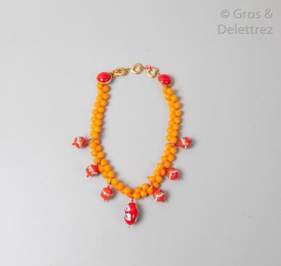 Yves Saint LAURENT Rare collier composé de perles en pâte de verre orange, orné de...