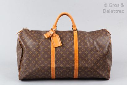 LOUIS VUITTON Sac " Keepall " 60cm en toile monogram et cuir naturel, fermeture éclair...