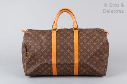 LOUIS VUITTON Sac " Keepall " 50cm en toile monogram et cuir naturel, fermeture éclair...