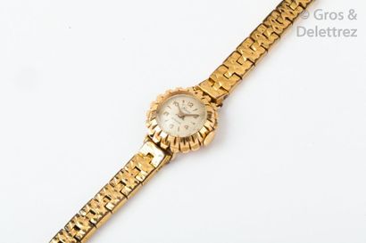 HERMA Bracelet-montre de dame, le boîtier en or jaune, le bracelet en métal. P brut?:...