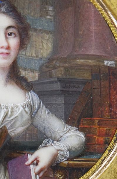 Augustin DUBOURG (1758-vers 1800) Jeune femme assise tenant un livre dans une bibliothèque.	

Miniature...