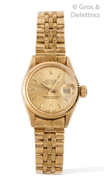 ROLEX Oyster Perpetual -date just-	

Bracelet-montre de dame en or jaune, boîtier...