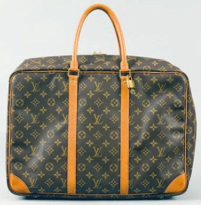 Louis VUITTON Valise souple «Sirius» en cuir monogram et cuir naturel, fermeture...