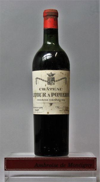 null 1 bouteille CHÂTEAU LATOUR A POMEROL 1947 

Etiquette légèrement tachée, niveau...