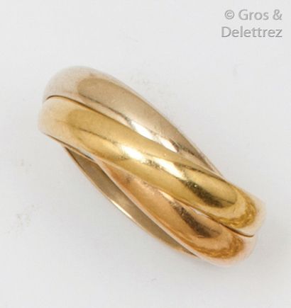 CARTIER « Trinité » Bague trois anneaux en or de trois couleurs. Tour de doigt :...