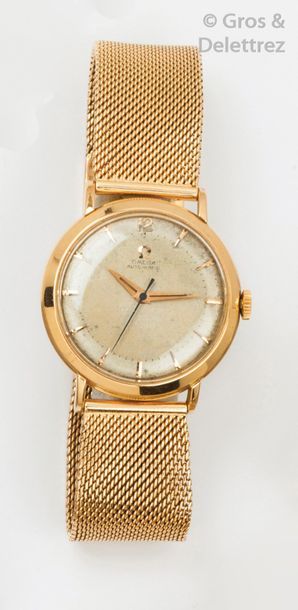 OMEGA (vers 1954) Montre bracelet en or jaune. Boîtier rond. Cadran blanc avec index...