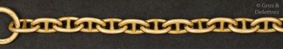 HERMES Bracelet en or jaune à maille marine. Signé Hermès. P. 94,1g. Longueur : ...