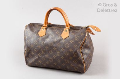 null Louis VUITTON 

Sac « Speedy " 30cm en toile Monogram et cuir naturel, fermeture...