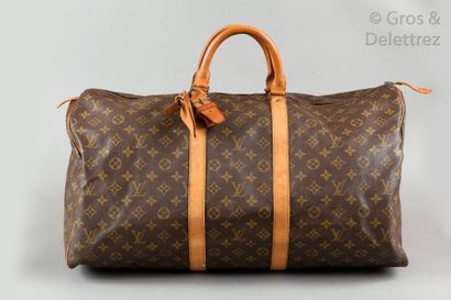 null Louis VUITTON 

Sac " Keepall " 55cm en toile Monogram et cuir naturel, fermeture...