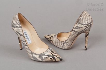 null Jimmy CHOO

Magnifique paire d'escarpins "Anouk" en serpent élaphe partiellement...