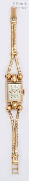 null Bracelet-montre de dame en or jaune, boîtier rectangulaire, cadran gris, bracelet...