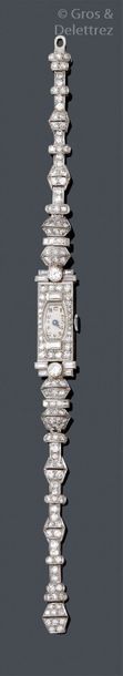 null Bracelet-montre de dame en platine et or gris orné de motifs géométriques intégralement...