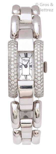 CHOPARD «?La Strada?» - Bracelet -montre de dame en or gris. Boîtier rectangle curvex,...
