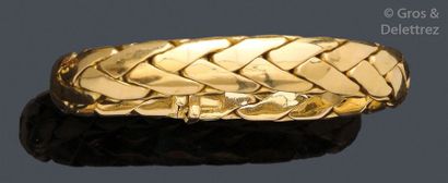 Bracelet souple en or jaune torsadé. Longueur?:...