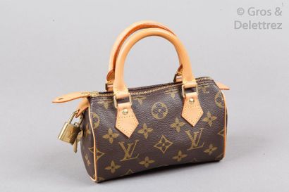 LOUIS VUITTON Sac «Mini HL» 16cm en toile Monogram et cuir naturel, fermeture éclair,...