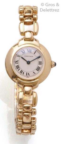 CARTIER Montre de dame en or jaune. Boîtier rond, cadran blanc, index appliqués,...