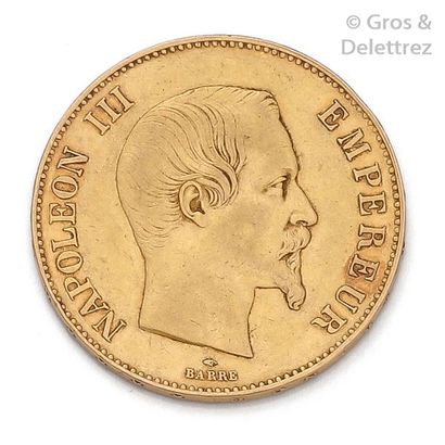 null Pièce de 100 Francs or Napoléon III tête nue, 1859.
Diamètre: 3,5cm. P. 32,...
