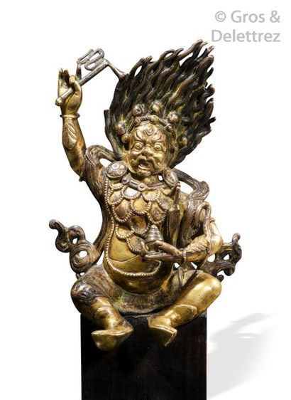 null Tibet, XXe siècle	

Statue en alliage de cuivre doré, représentant Mahakala...