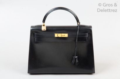 HERMÈS Paris made in France année 1971 *Sac «?Kelly Sellier?» 33cm en box noir, attaches...