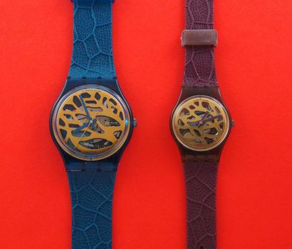 null SWATCH, lot de 2 montres comprenant les modèles suivants :

-Blue Leaves (Bracelet...