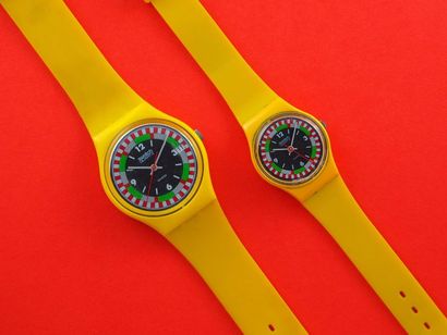 null SWATCH, lot de 2 montres comprenant les modèles suivants :

-Yellow Racer (Bracelet...