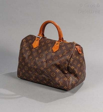 LOUIS VUITTON Sac "Speedy" 30cm en toile Monogram et cuir naturel, fermeture éclair,...