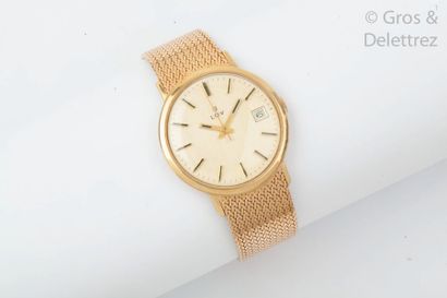  LOV - Bracelet-montre en or jaune, boitier rond, cadran or, date à 3 h, mouvement...