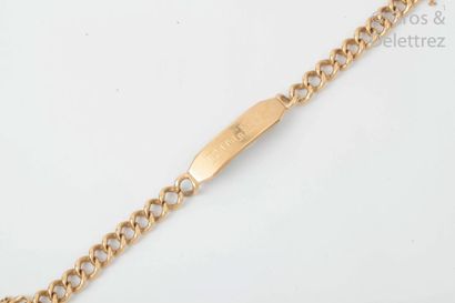  Bracelet "Gourmette" en or jaune. Longueur : 20 cm. P. Brut : 35,9 g.