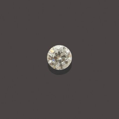 null DIAMANT rond taille ancienne sur papier, G/SI2.

Poids : 5.10 cts

Accompagné...