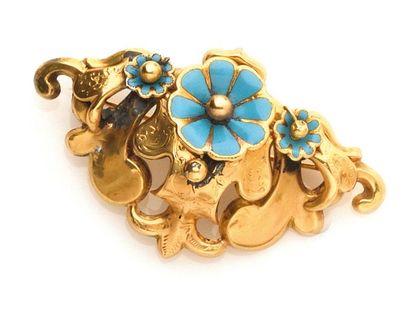 null BROCHE à décor floral en or jaune 750MM, pétales appliqués d’un émail turquoise,...