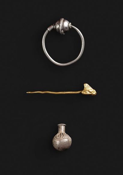 null Set consisting of a pin adorned with a yellow gold fly, a silver earring and...