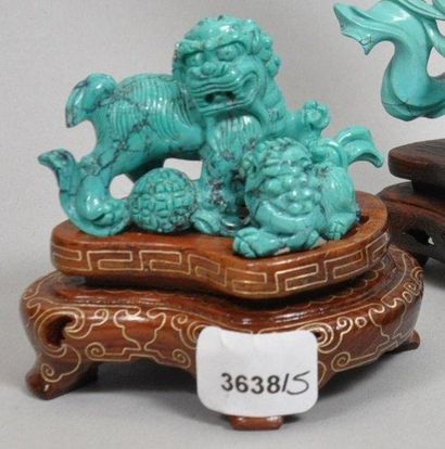 Groupe deux lions stylisées en turquoise...