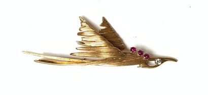 null LACLOCHE
BROCHE en or (750) en forme d'oiseau stylisé, ponctué d'un petit diamant...