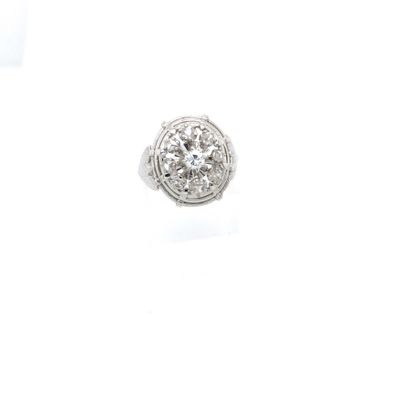 null BAGUE en or gris (750) et platine (850) ornée d'un petit diamant taille brillant...