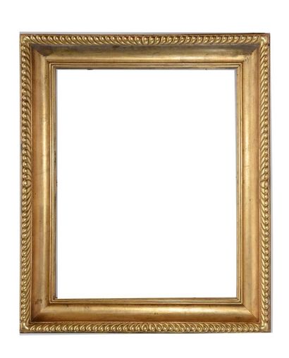 null FRAME in fir tree and gilded stucco with decoration of gadroons larmés. 

Italy,...