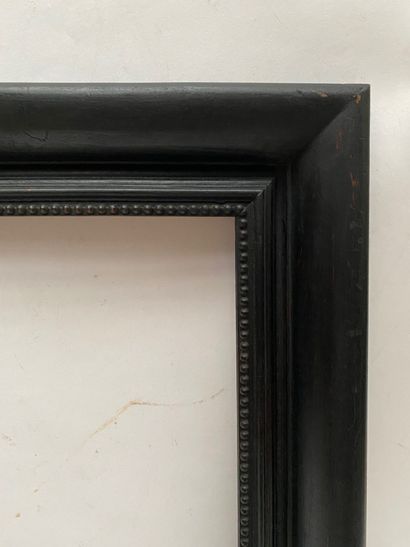 null Moulded, carved and blackened wood frame with beaded frieze decoration 

Netherlands,...