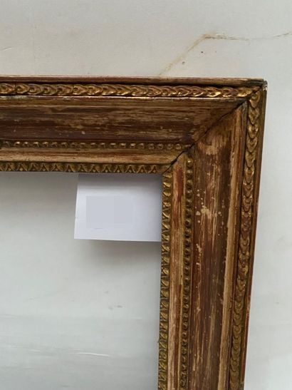 null carved oak frame, gilded with raise-de-coeur decoration, pearl friezes and posts

Louis...