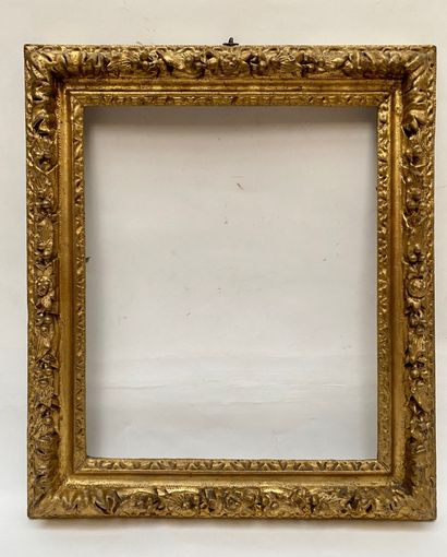 null carved and gilded oak frame with friezes of water leaves and laurel twists 

Louis...