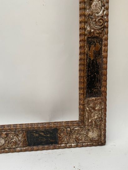 null Cassetta" frame in blackened and silvered wood with reserves in the corners...