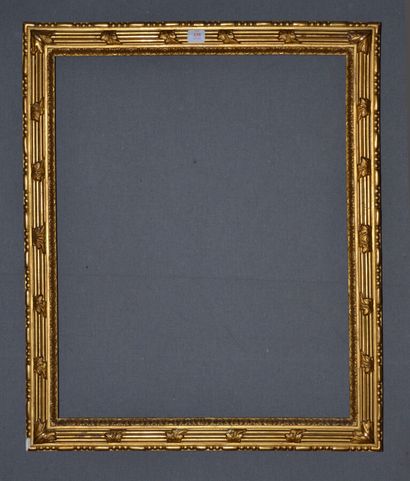 null Moulded wood frame, gilded with acanthus leaf fillets and friezes of pearls,...