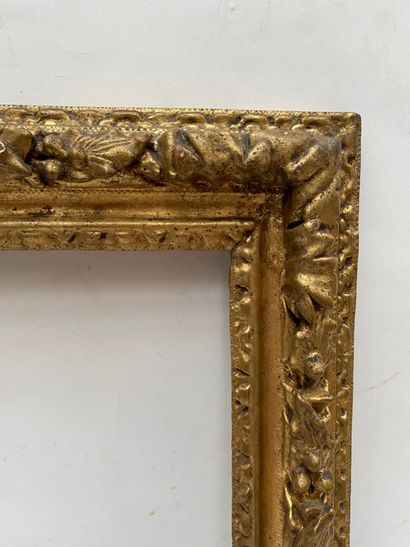 null carved and gilded oak frame with friezes of water leaves and laurel twists 

Louis...